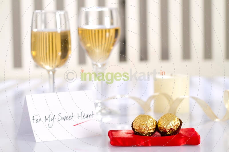love message with chocolates and drinks