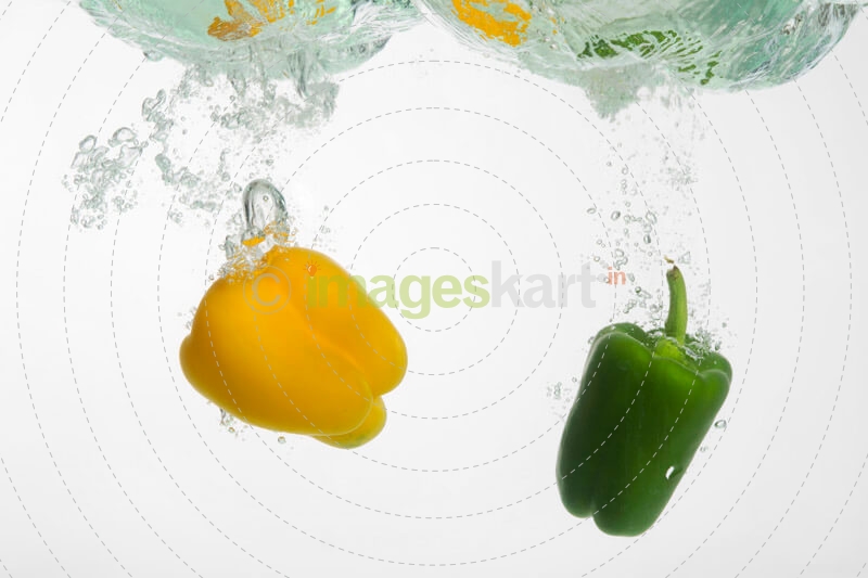 fresh capsicums dropped in water