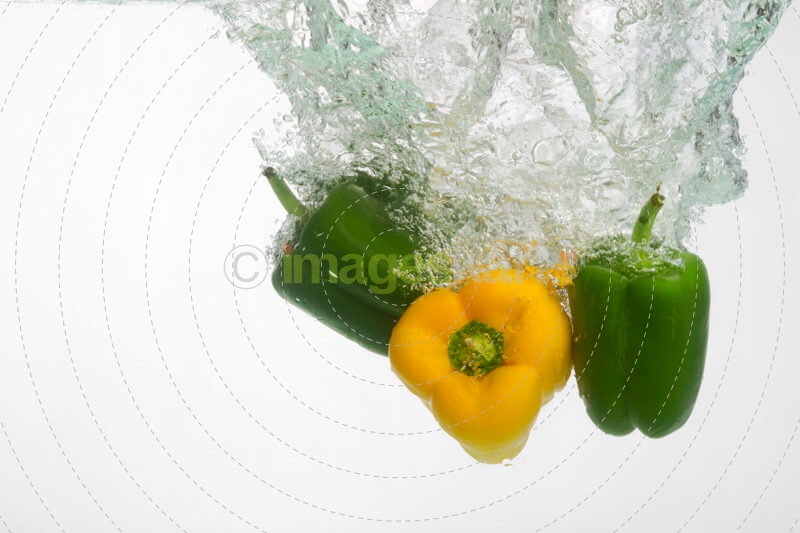 fresh capsicums dropped in water