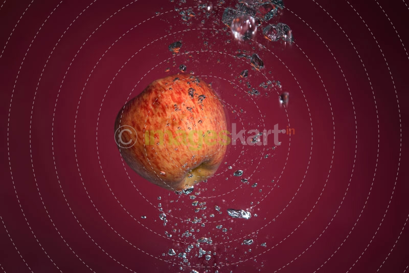 apple dropped into water