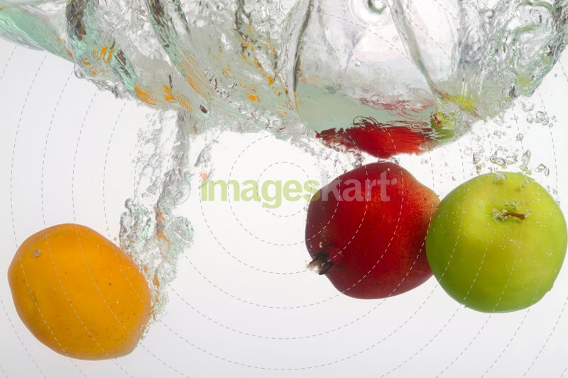 raw fruits sinked in a water tank