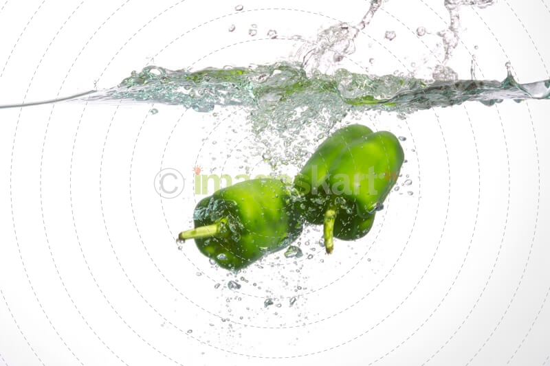 fresh vegetables in a transparent water tank