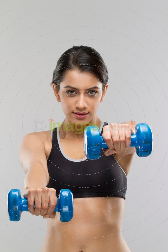 girl with dumbbells