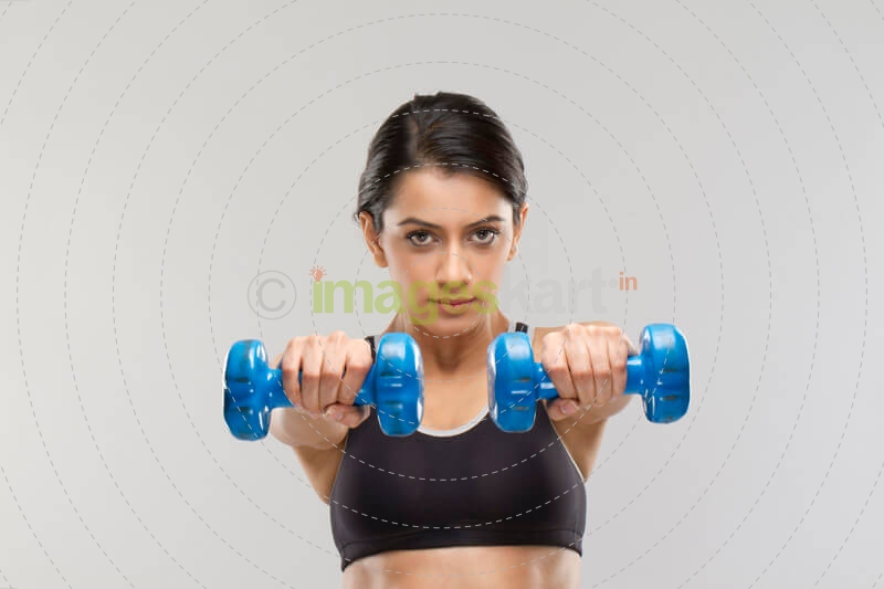 girl with dumbbells