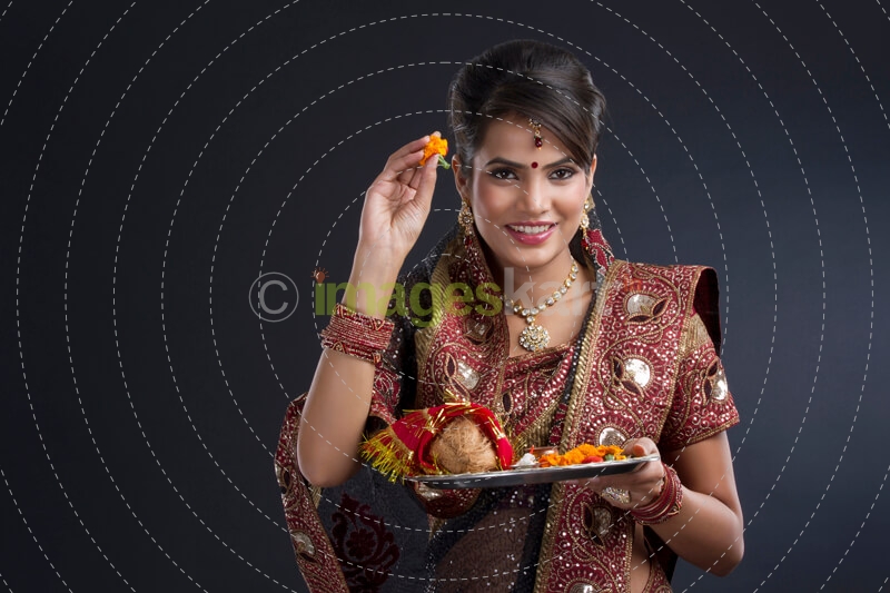 Indian woman doing puja