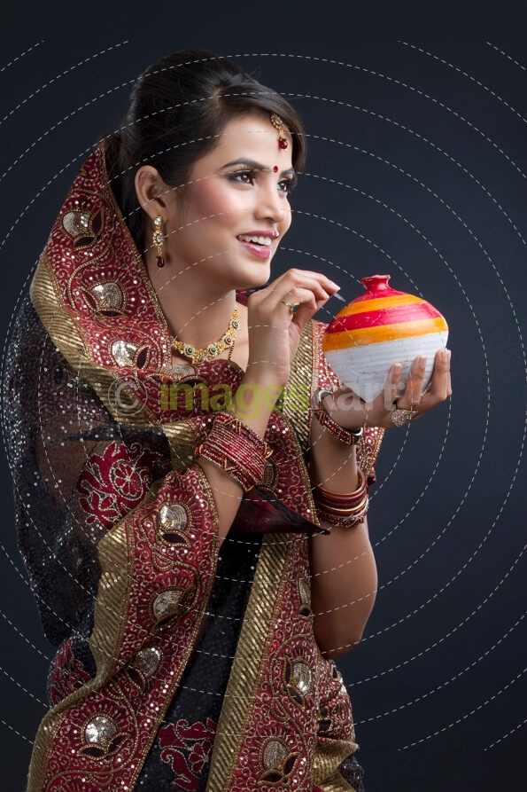 Indian woman saving money