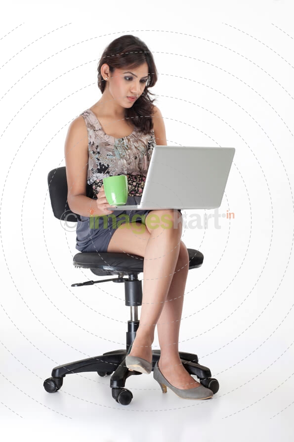 corporate girl with a laptop and cup of coffee