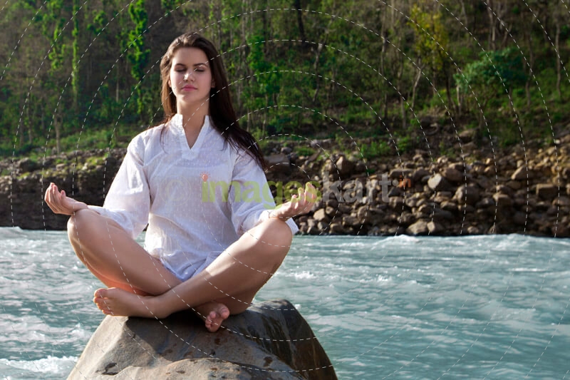 beautiful woman performing meditation 