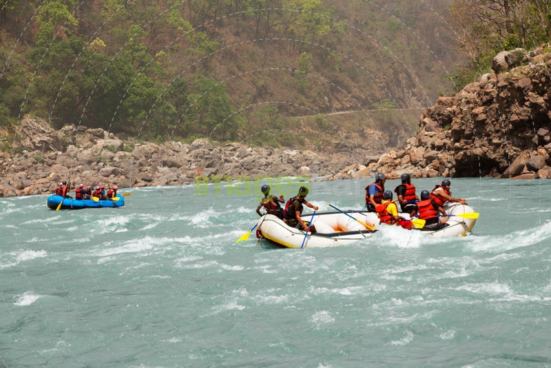 beautiful landscape of two boats river rafting together