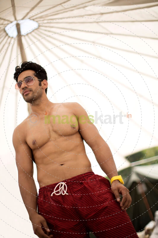 man with good built and physique posing for the camera