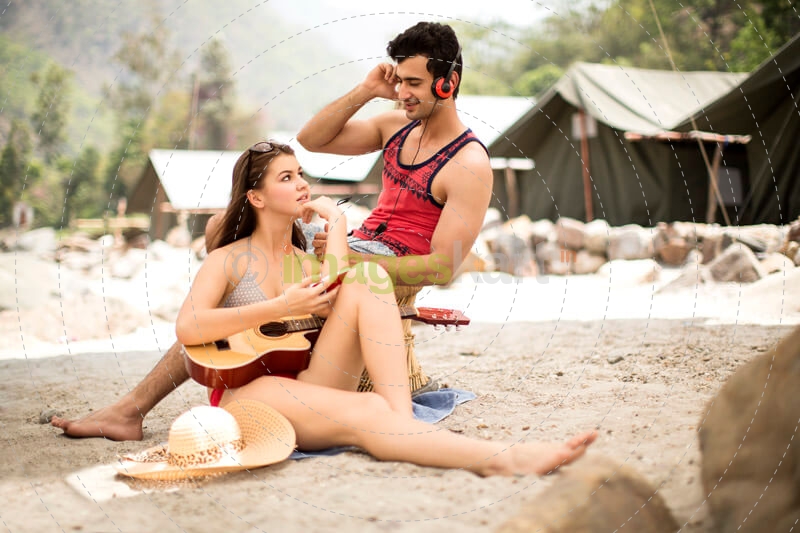young couple spending time together on a beach