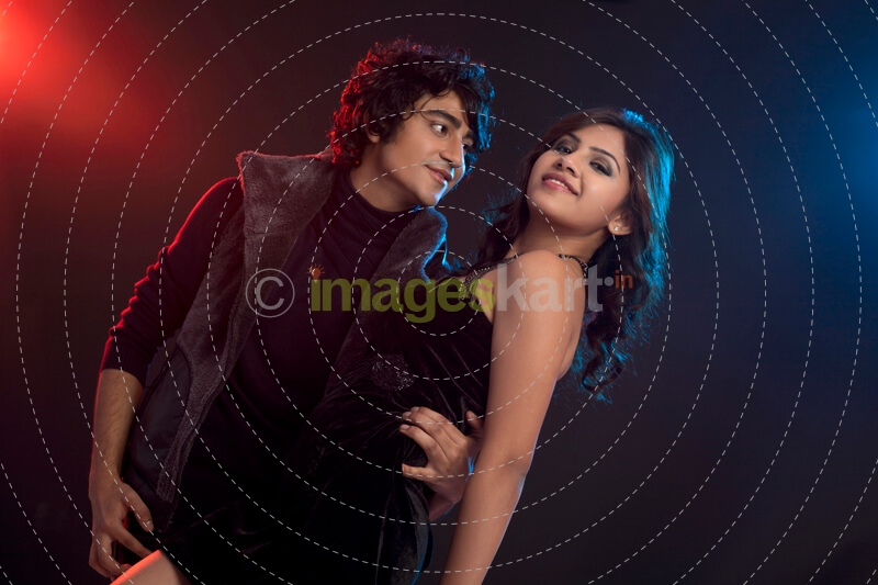 boy holding and girl while dancing