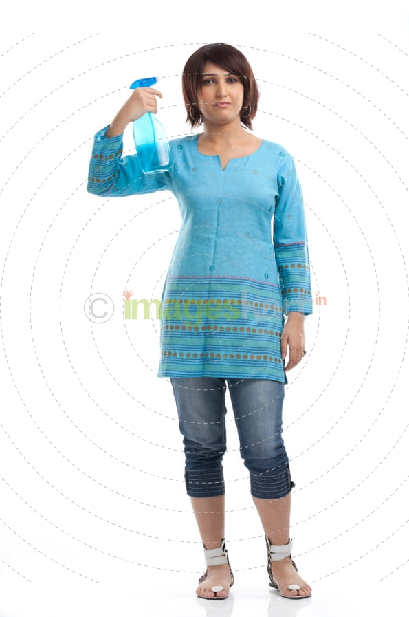 a woman with short hair carrying a cleaning product
