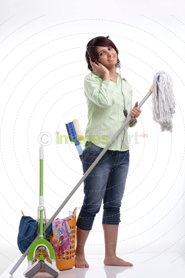 woman standing and posing with household works