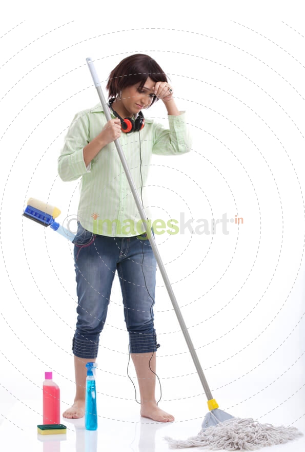 woman wiping sweat from a day long household work
