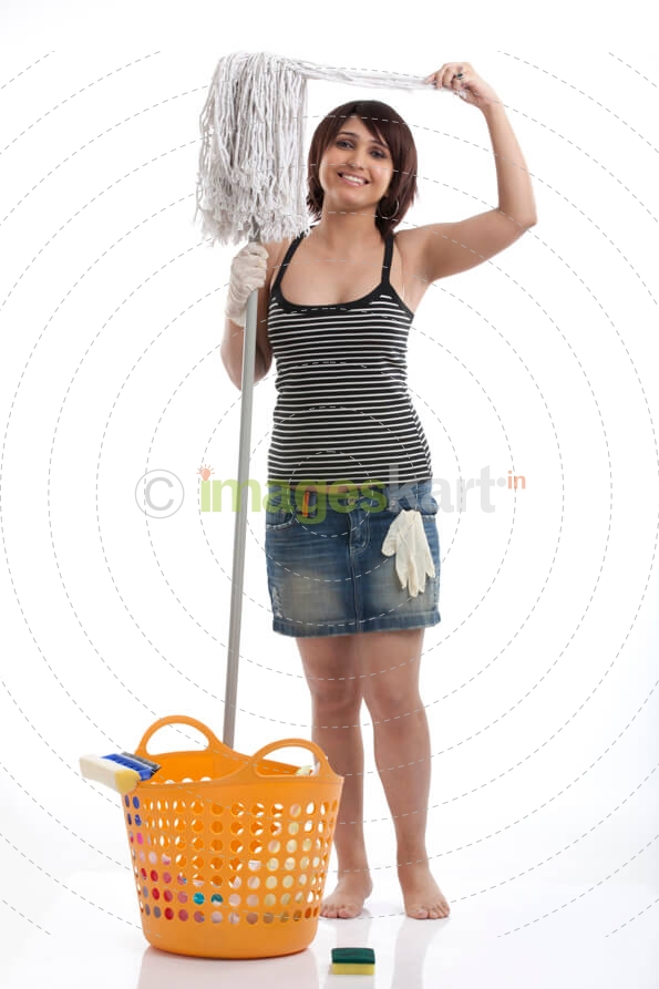 woman smiling and posing with cleaning mop