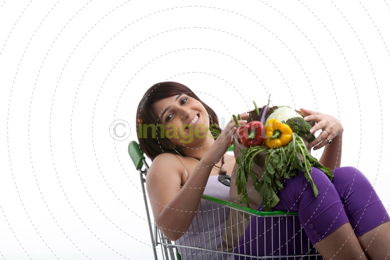lady looking relaxed after buying vegetables