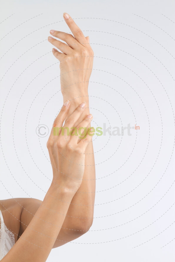 close-up of a young woman showing her arms