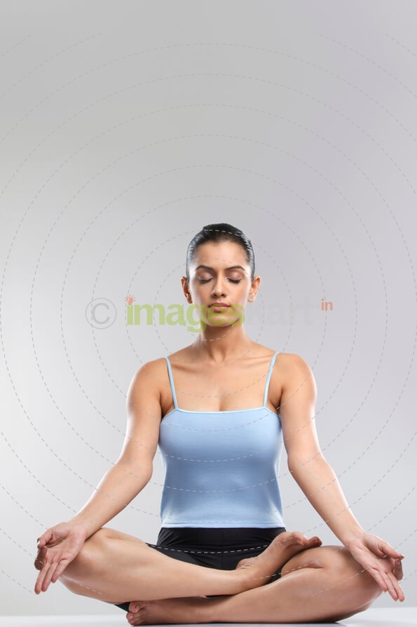 girl meditating with eyes closed