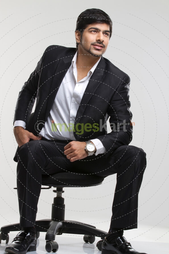 businessman sitting on office chair 