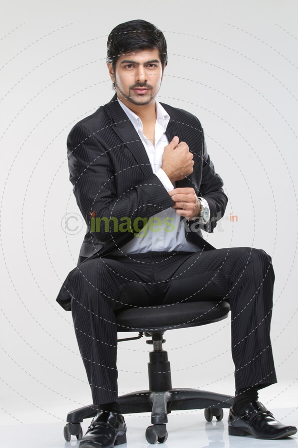 corporate man sitting on chair