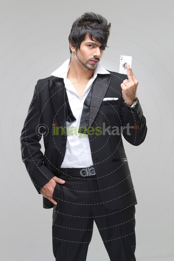man posing with an ace of card