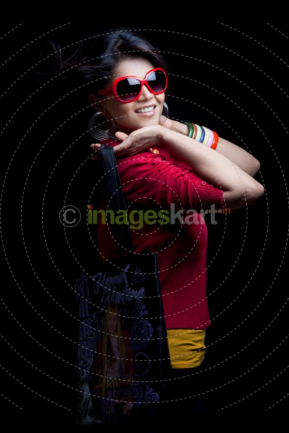 girl in stylish clothing with a trendy handbag