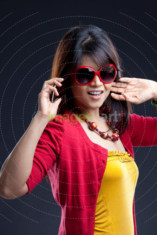 attractive young female with a mobile phone