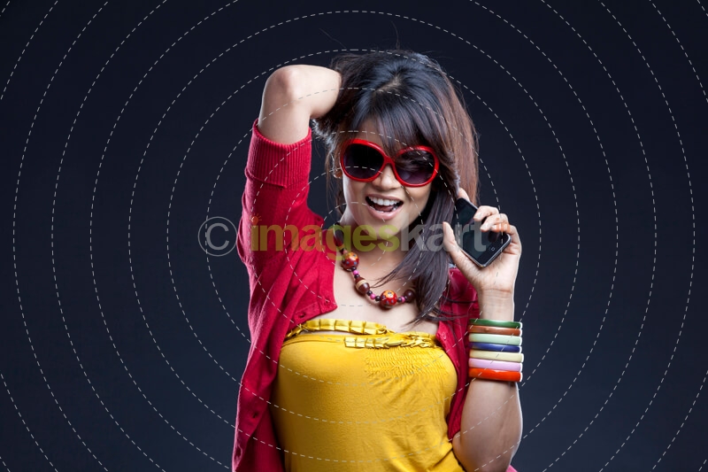 beautiful woman smiling with cell phone