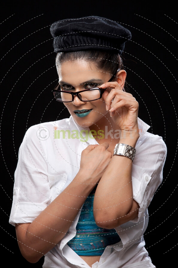 girl giving a sensual look at the camera with spectacles