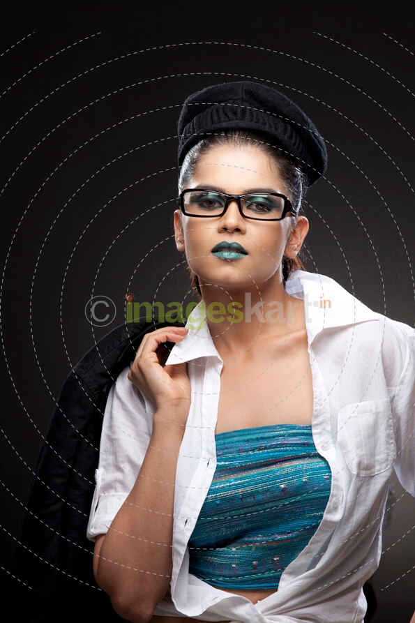 woman holding a blazer