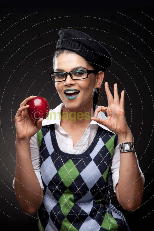 woman wearing sweater and glasses