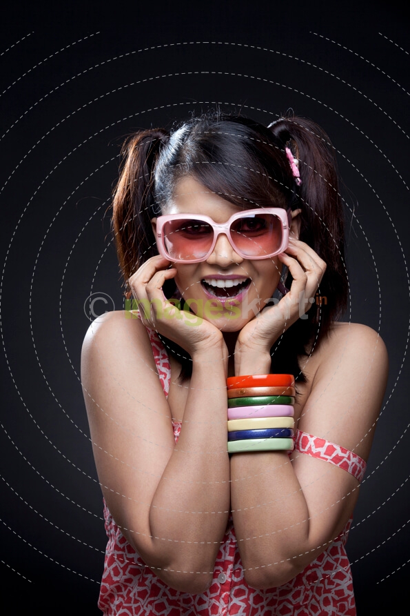 surprised teenager in pigtails
