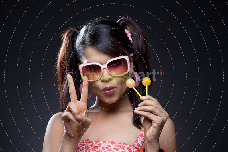girl posing with candies 