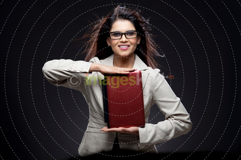 businesswoman posing with a mini laptop