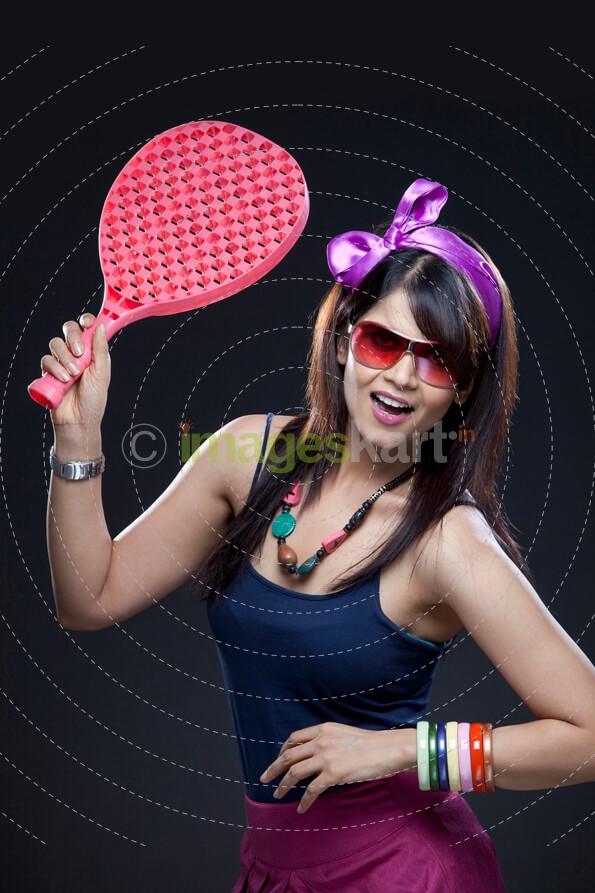 woman with a racket in hand