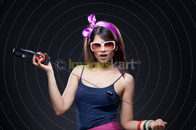 model posing with headphones