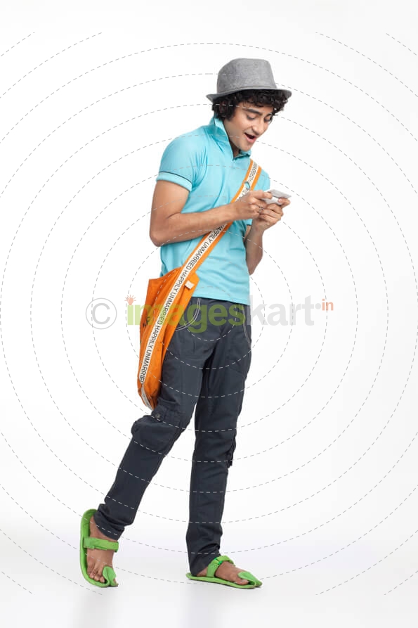 young teenager texting on the cell phone