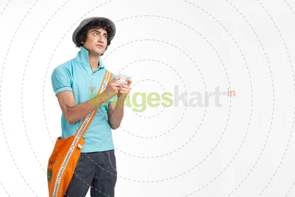 boy thinking while texting 