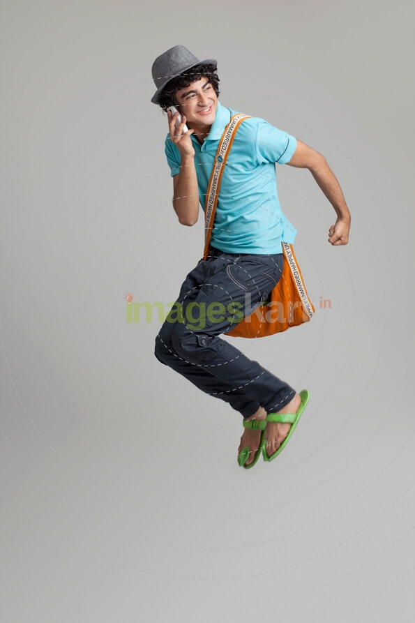 college student jumping in excitement