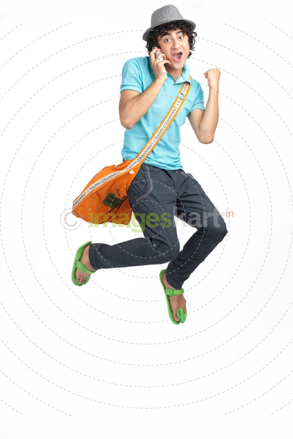 college student jumping in excitement