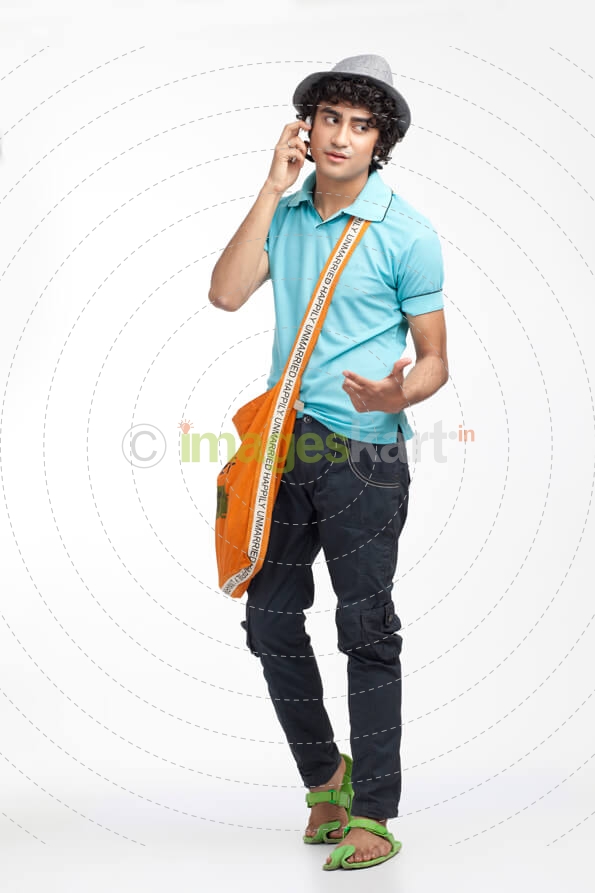 portrait of a boy talking on the phone