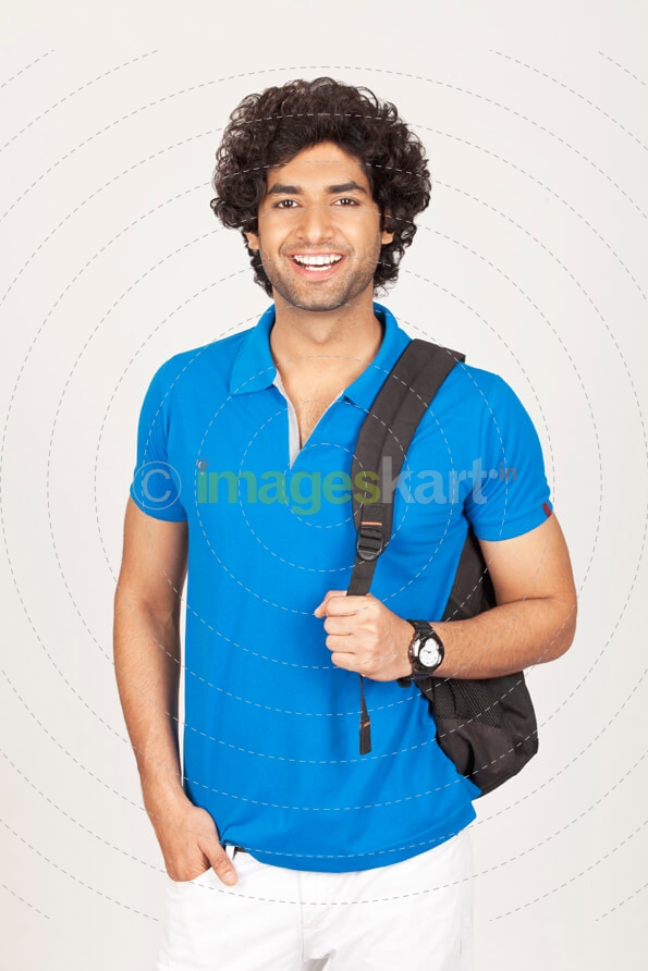 college boy smiling and posing for the camera 