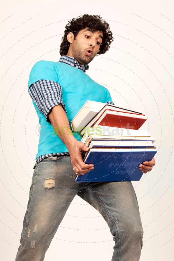 college boy carrying books