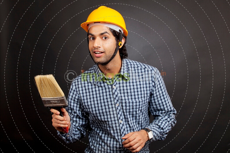 man ready to paint wall