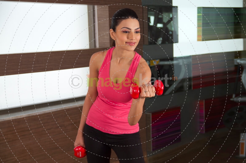 girl with dumbbells 