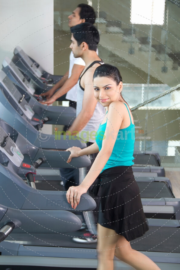 attractive woman posing while exercising