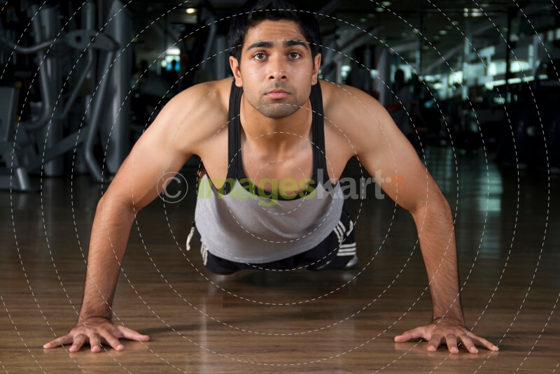 guy doing stressful push ups