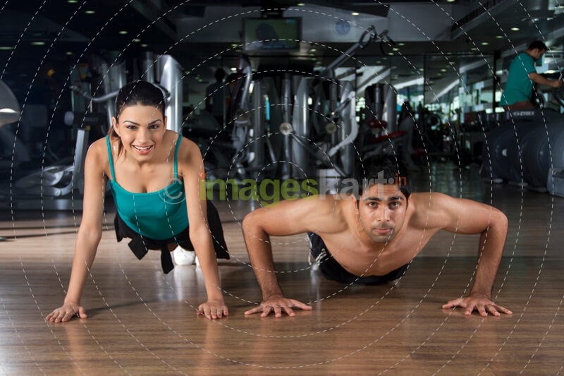 couple doing push ups together