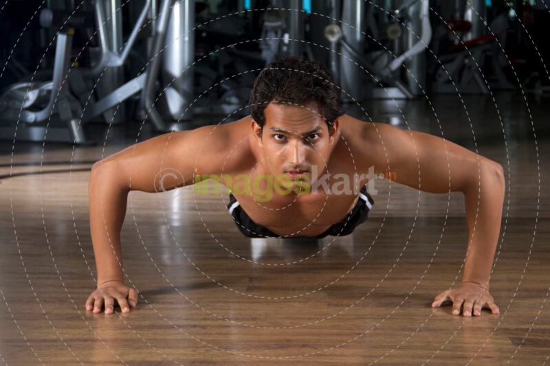 fit guy doing push ups